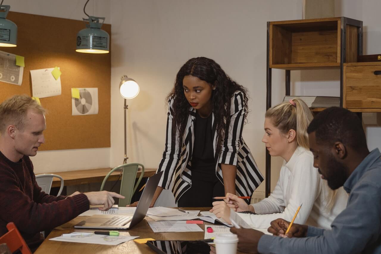 Work colleagues having a meeting in a relaxed workspace