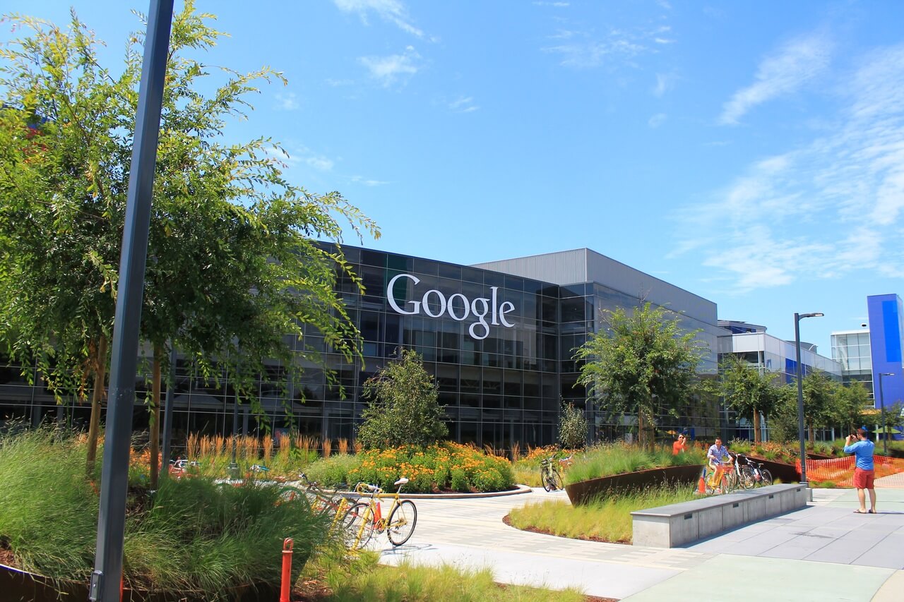 Google signage on the side of a corporate building