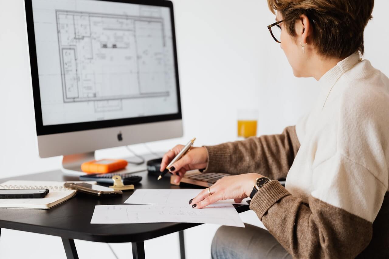 Business executive in office working on her computer