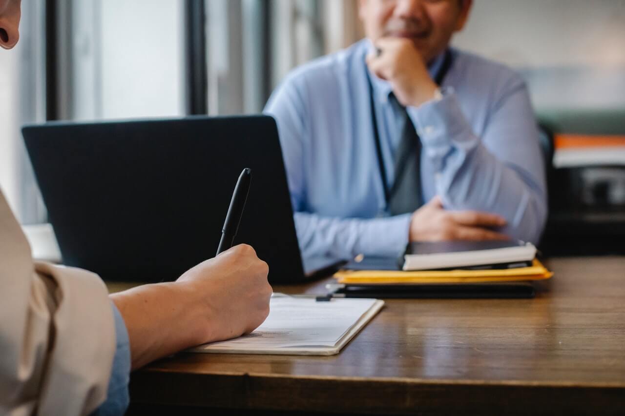 a businessman convincing a client to participate in CFC