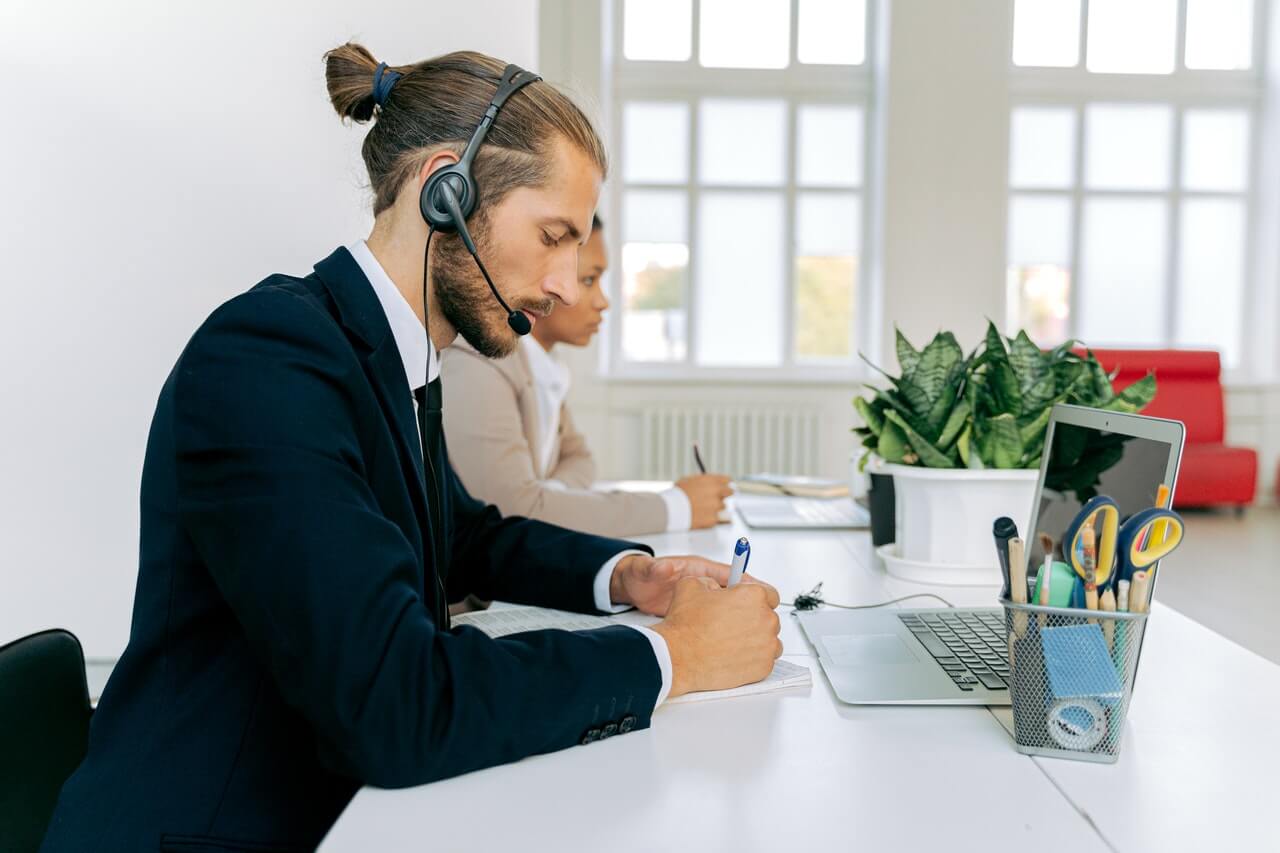 A man in suit working in an office