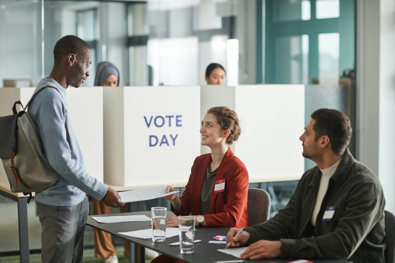 People in a voting center