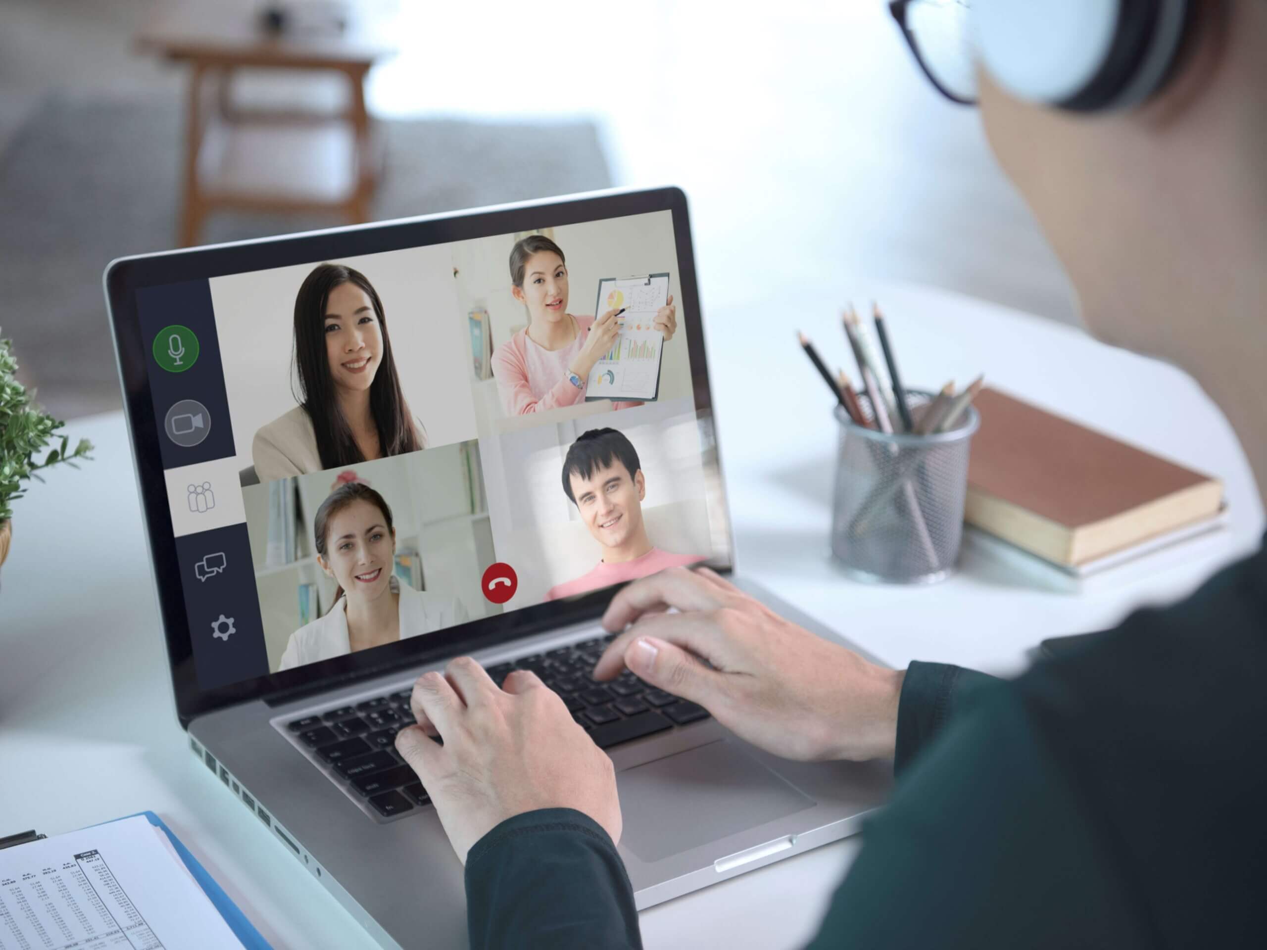 Businessman having a video conference meeting with colleagues