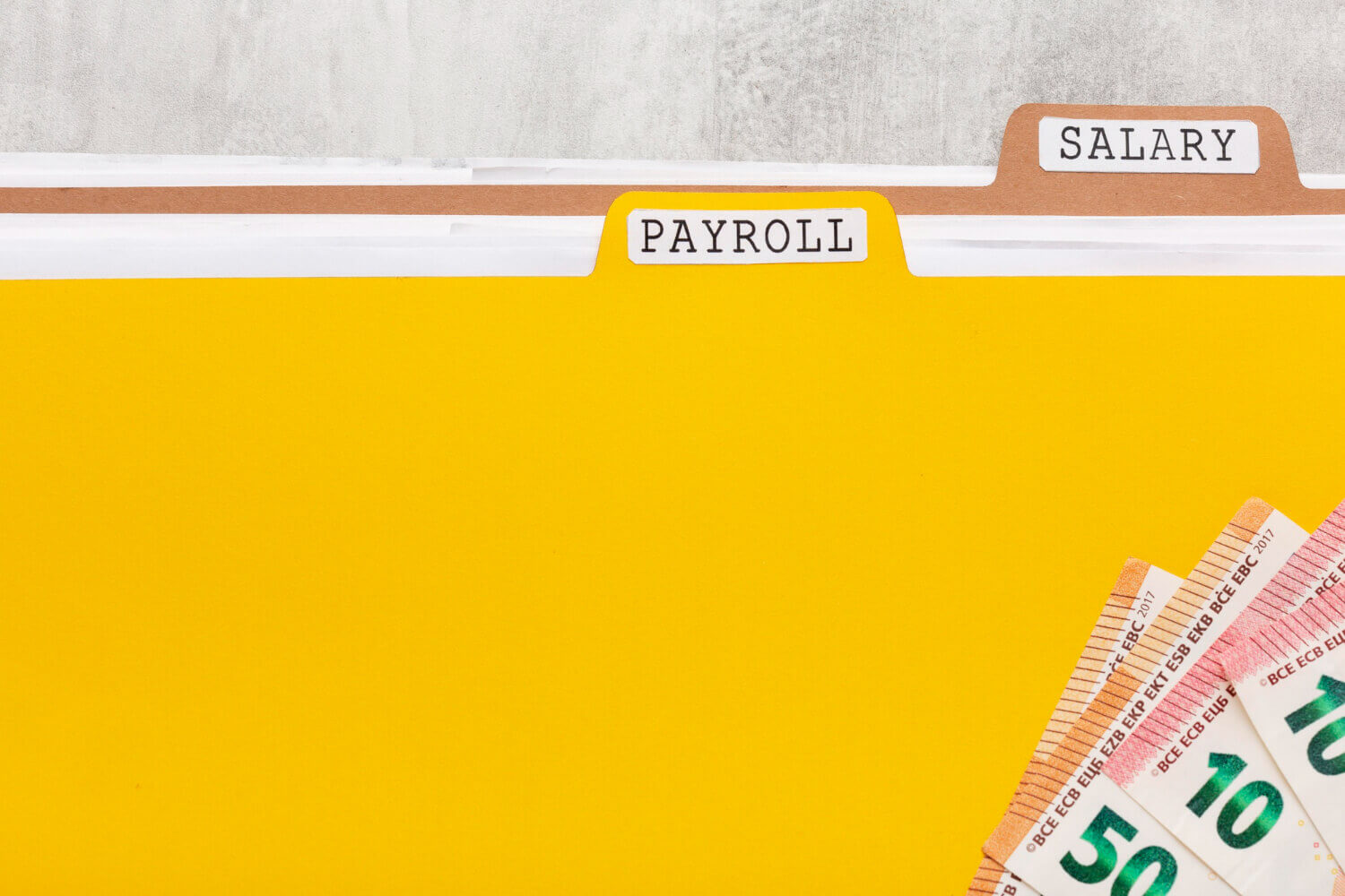 Payroll and salary documents on a desk