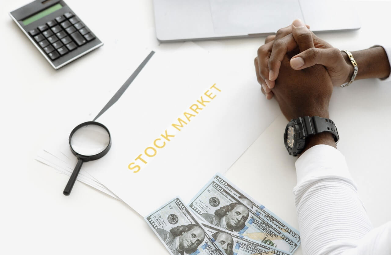 Stock market files on a desk