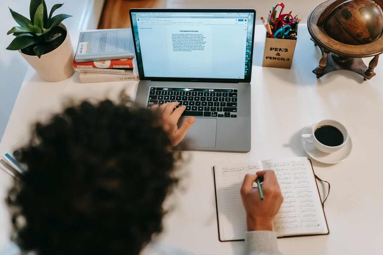 Person writing a grant proposal