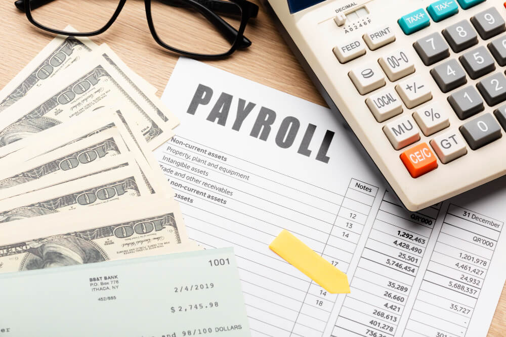 payroll software by industry concepts on a desk