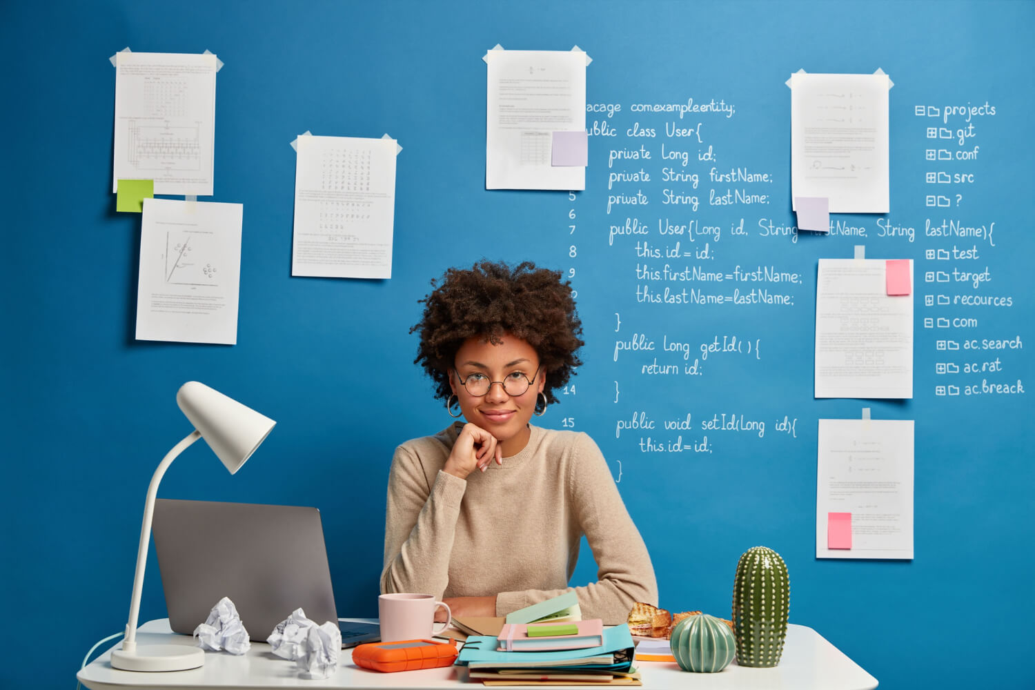 HR-staff-sitting-in-her-office-and-looking-at-the-camera