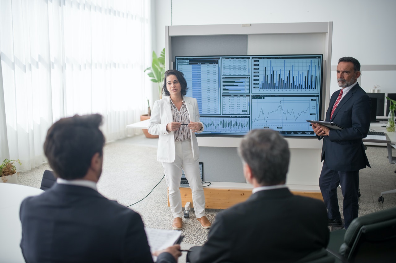 A-man-and-a-woman-giving-a-presentation-to-their-employers