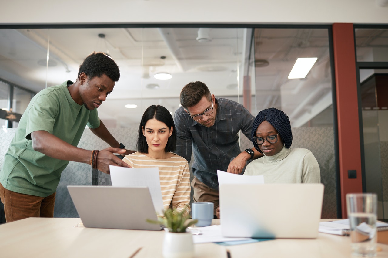 Two-female-workers-being-coached-in-their-workplace