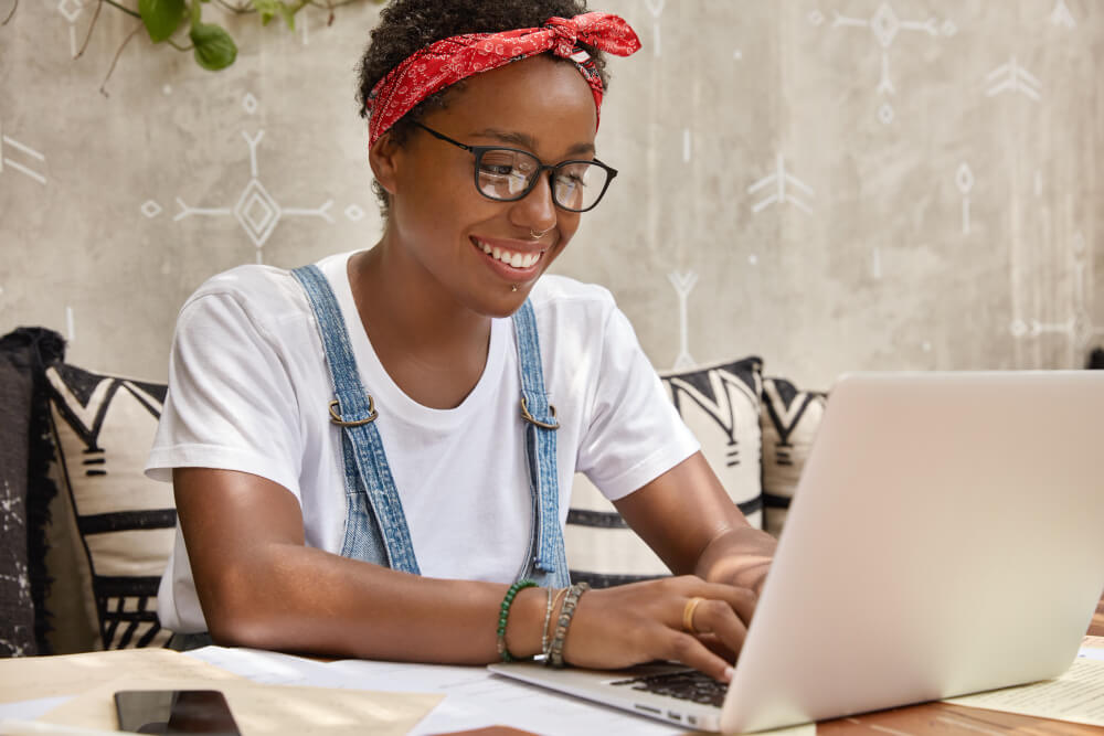 Businesswoman working remotely with laptop