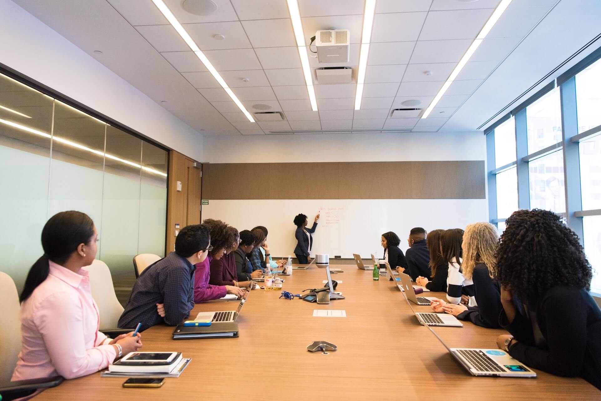 a-trainer-with-trainees-in-a-boardroom