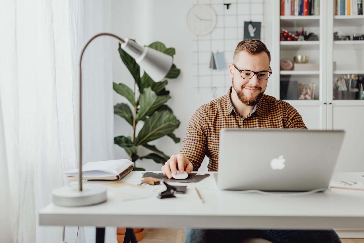 A young man working on his laptop