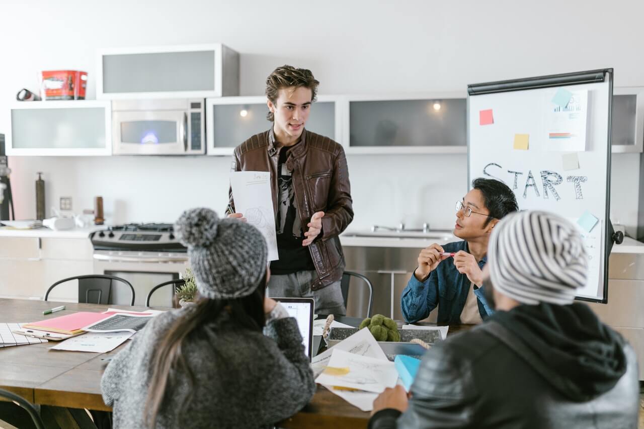 A Man Presenting during a Meeting