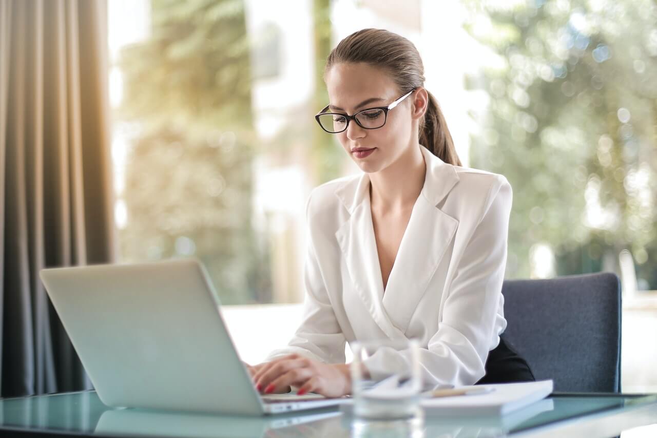 A young lady working with a laptop