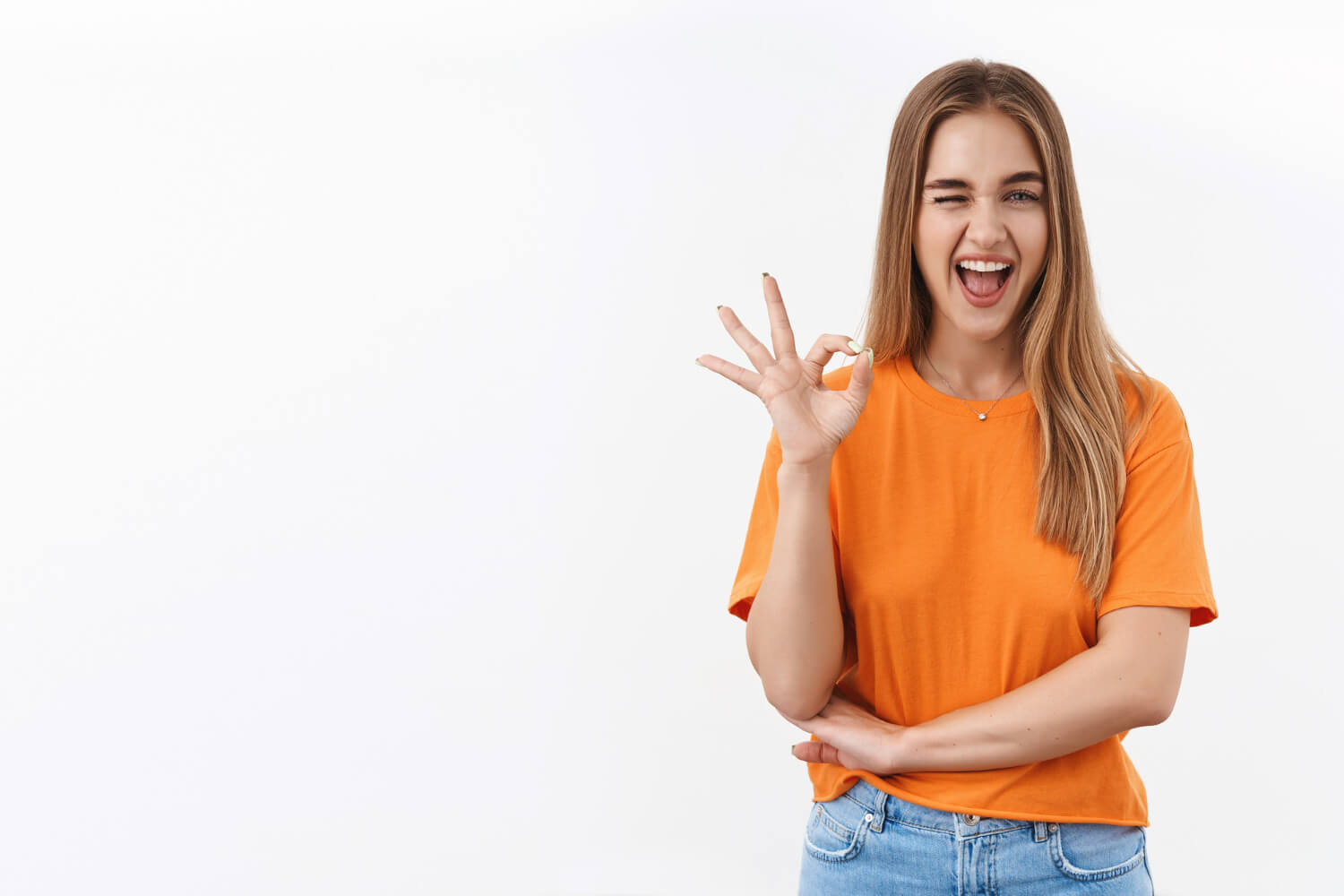 Young lady with an okay sign smiling