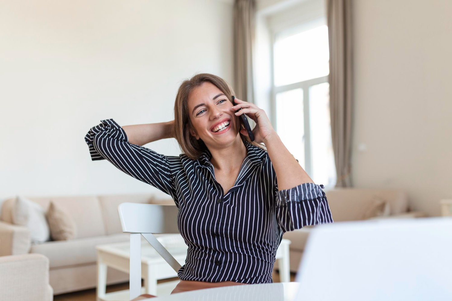 Young lady talking on the phone