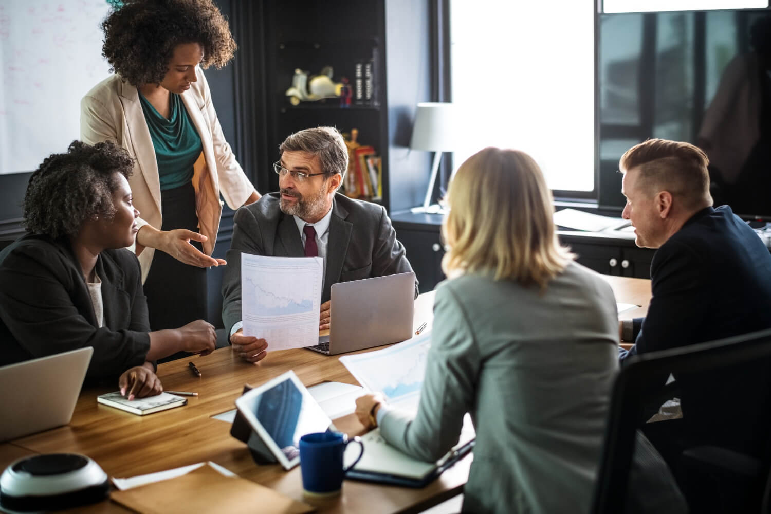 A-female-entreperneur-with-stakeholders-in-a-business-meeting.