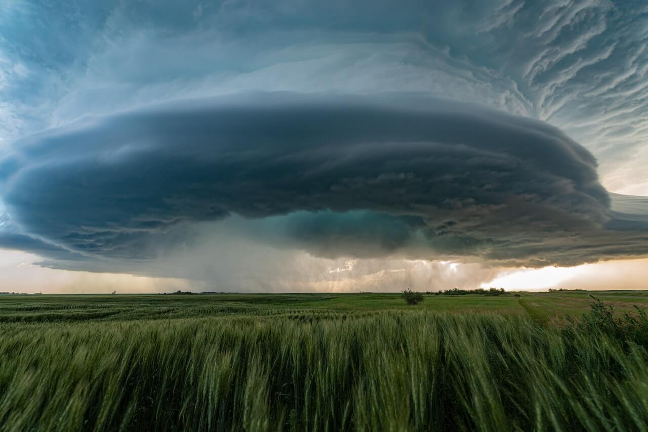 A-picture-of-a-storm-hovering-on-a-field.