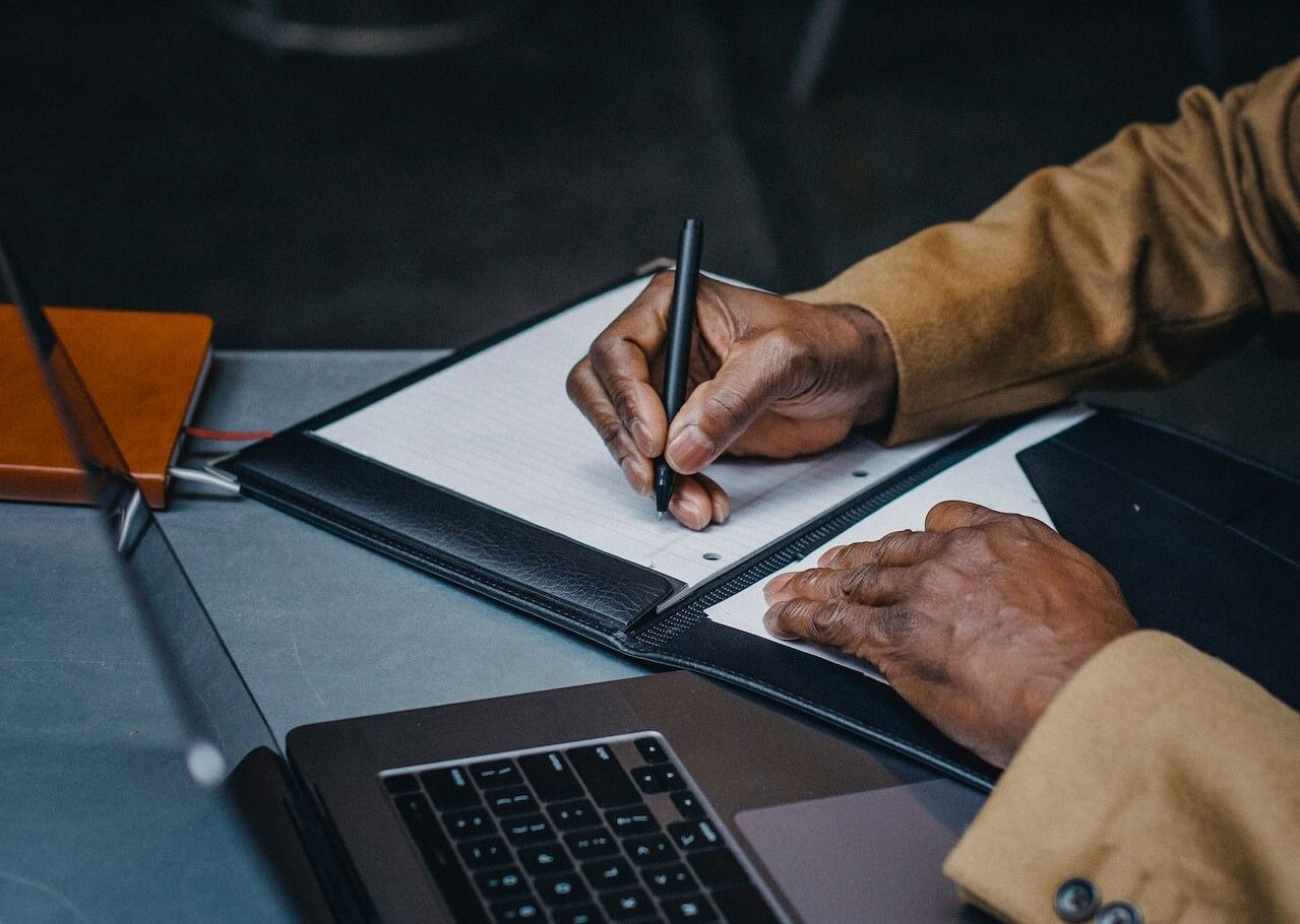 Business man checking a list