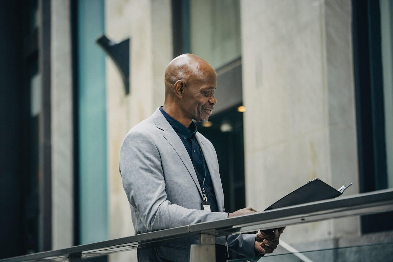 Manager reading documents in folder