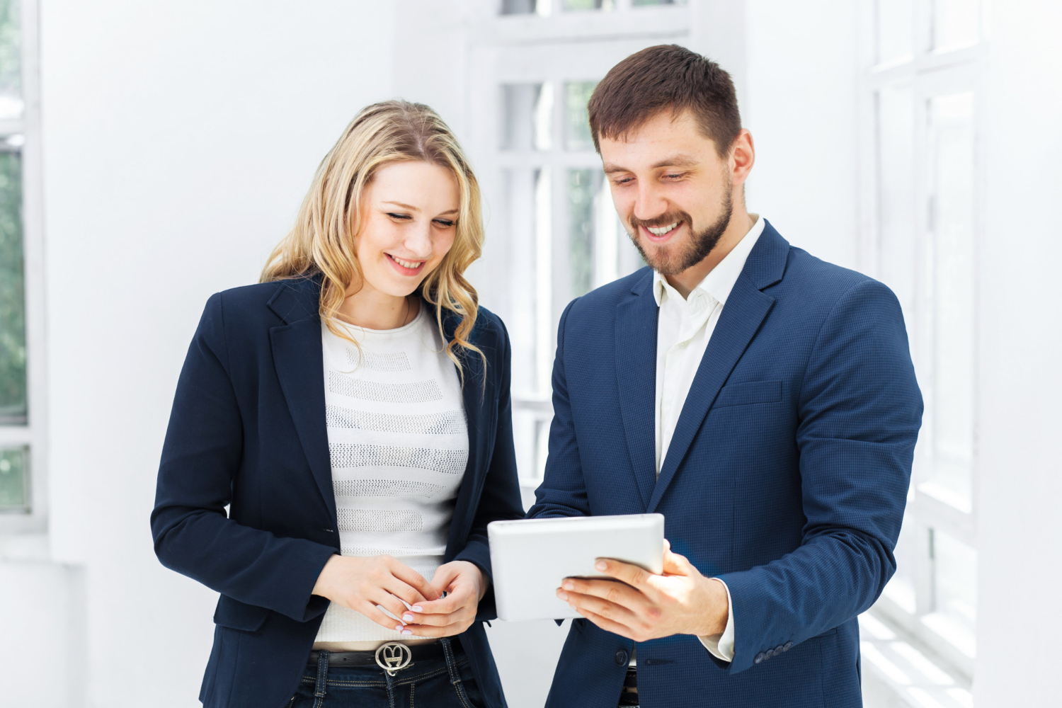 Business people looking at a tablet