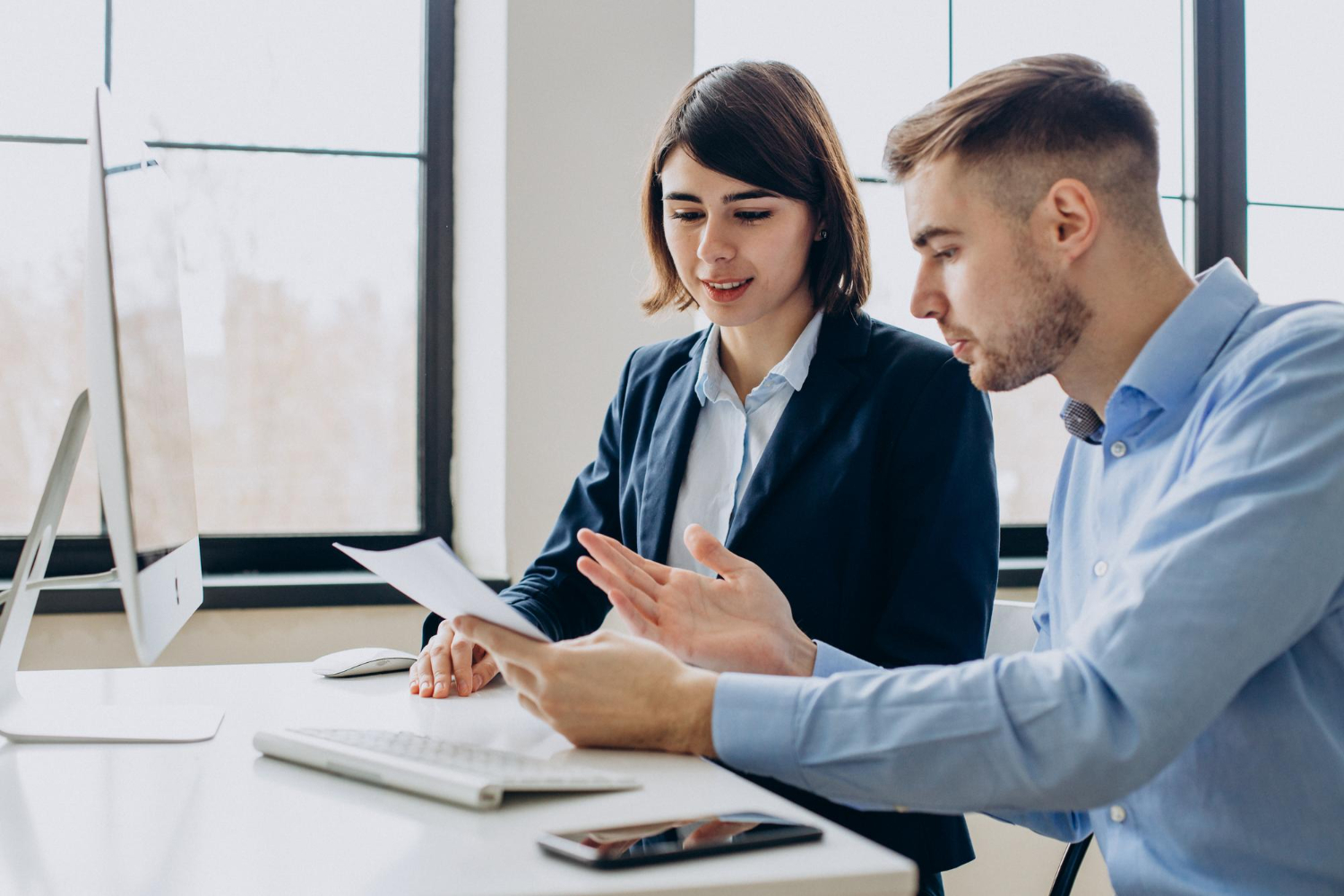 Business-team-working-office-discussing-job-issues