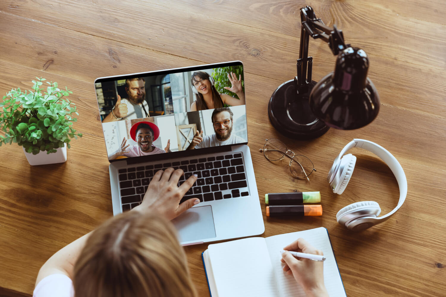 Lady having a virtual meeting with her team