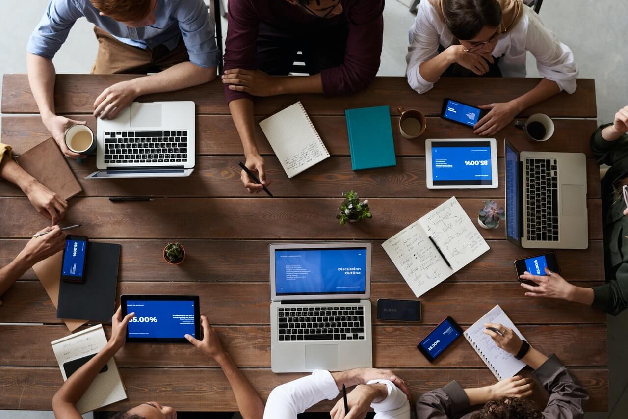 A group of nonprofit colleagues working on a project plan