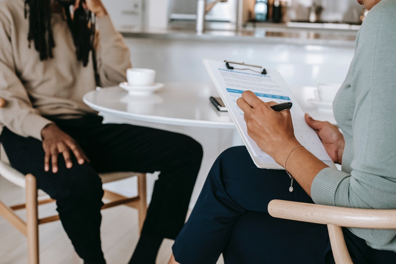 An interviewer and a job seeker in an interview session