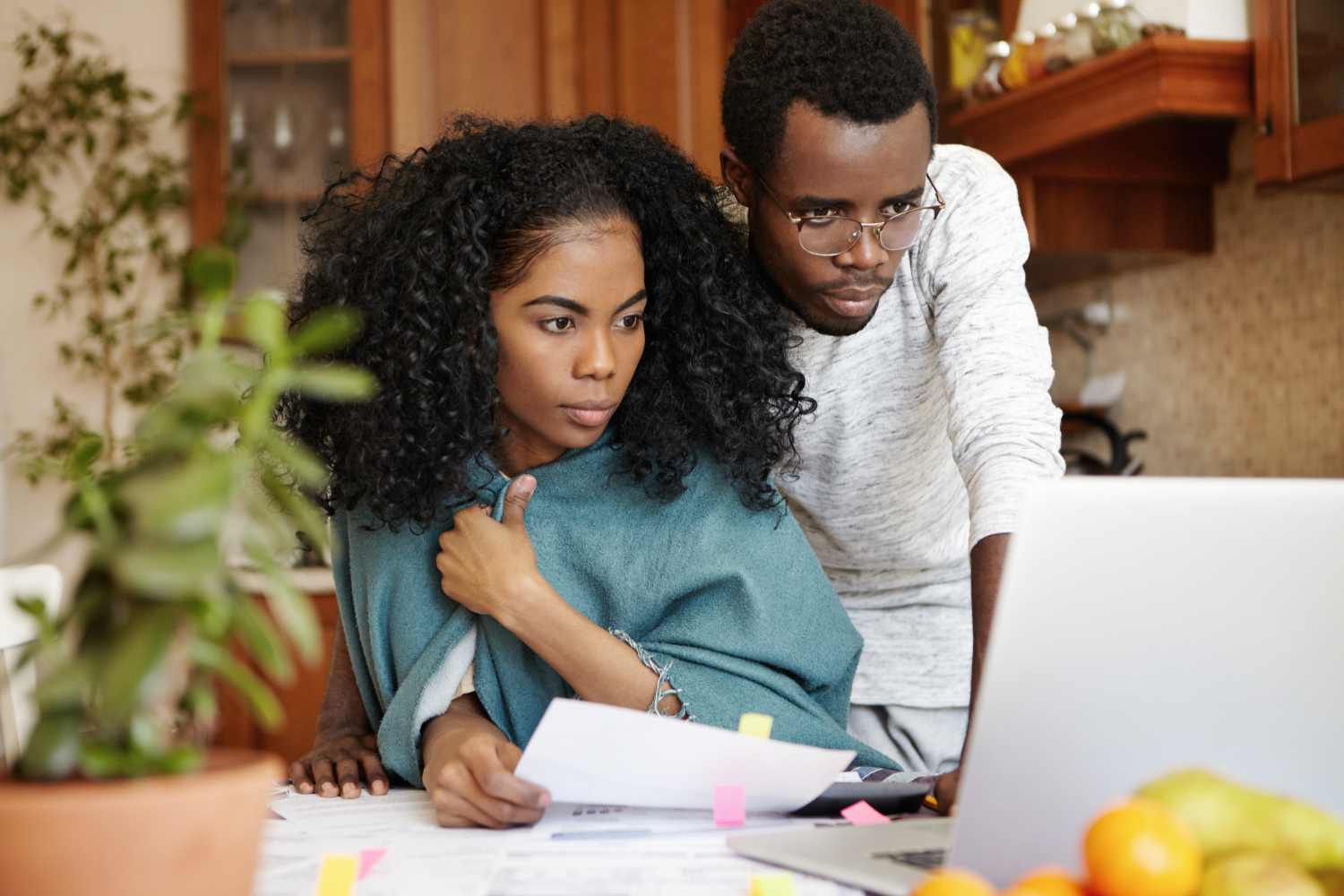 Two-employees-using-their-laptop-to-search-for-work-tasks