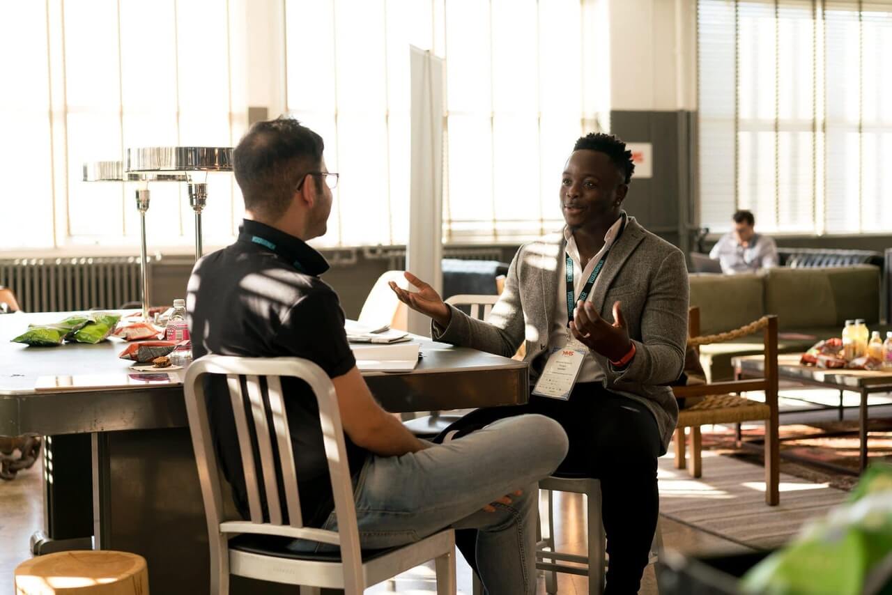 Two men talking about nonprofit topics