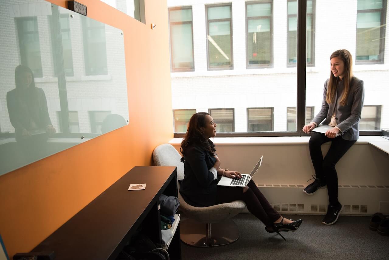 Young business women discussing