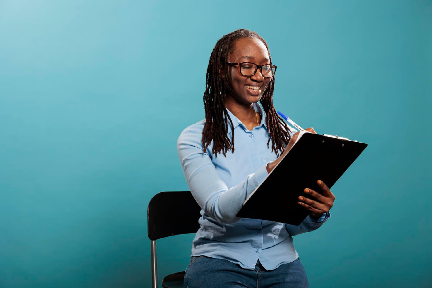 Young lady checking a list