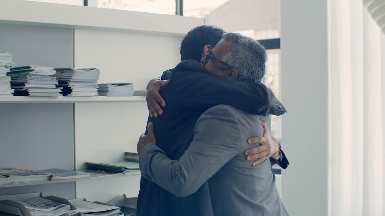 colleagues-hugging-each-other