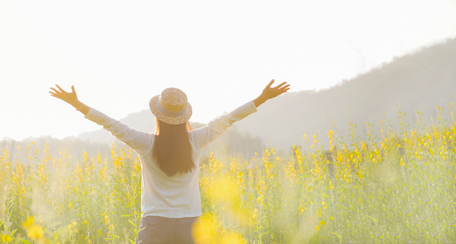 Female-teen--stand-feel-freedom-relaxation-travel-outdoor-enjoying-nature-with-sunrise