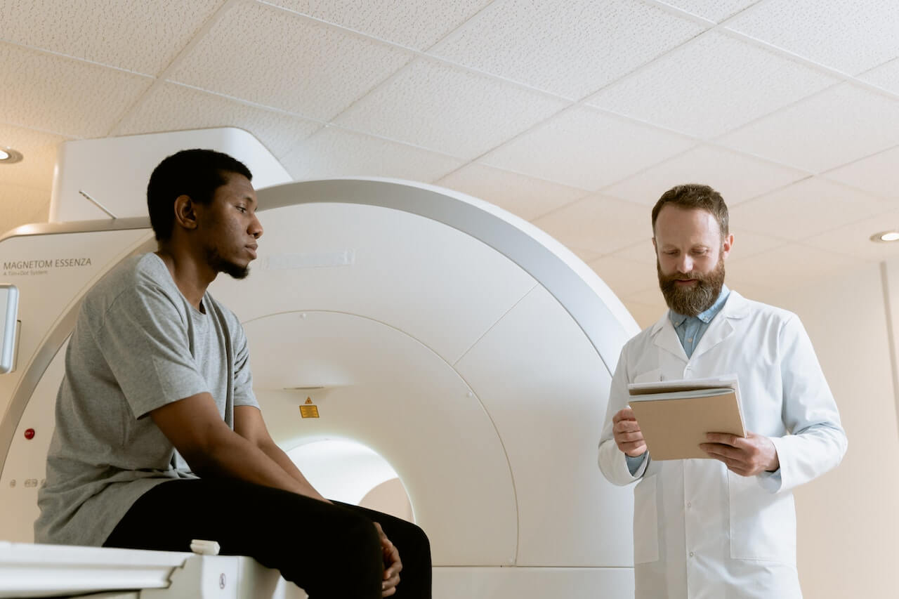 A doctor with a patient discussing during a medical check up