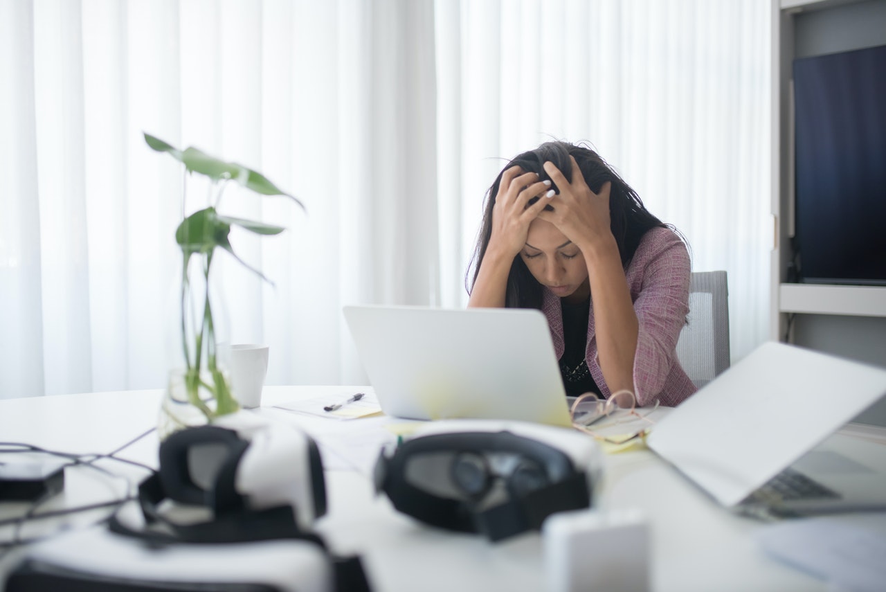 A woman working through some office crisis