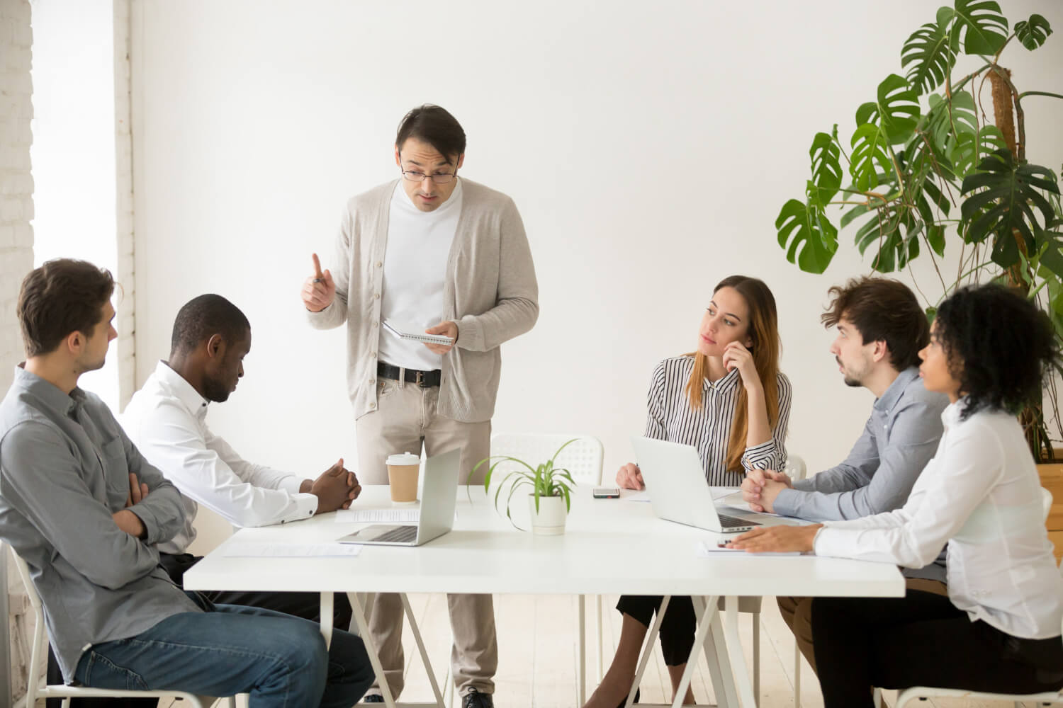 A-team-member-trying-to-convince-his-colleagues-to-follow-his-strategy.