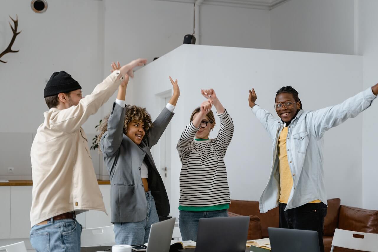 An-office-team-rejoicing-after-a-successful-task