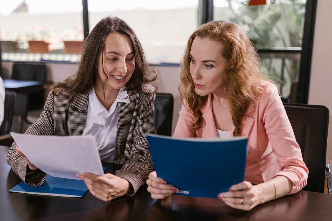 Colleagues looking at Documents