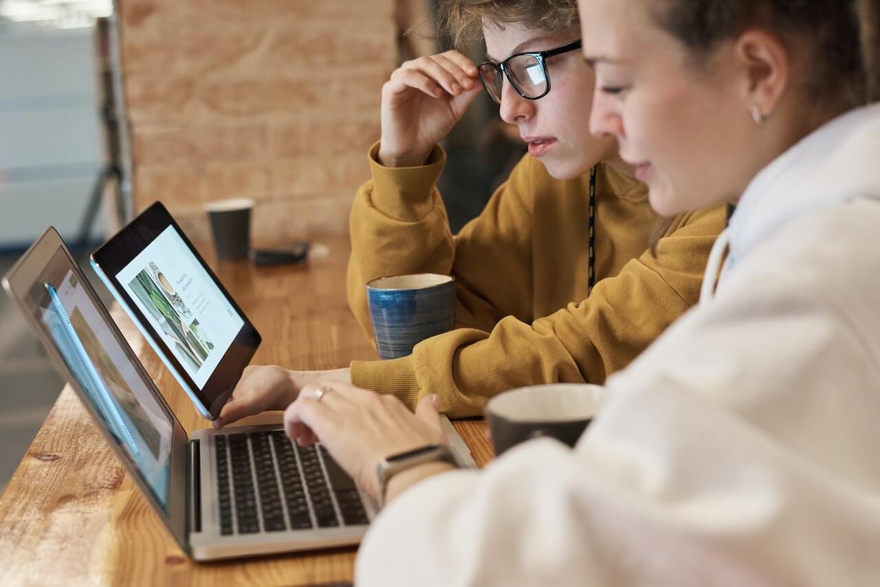 Photo Of Women Looking On Monitors