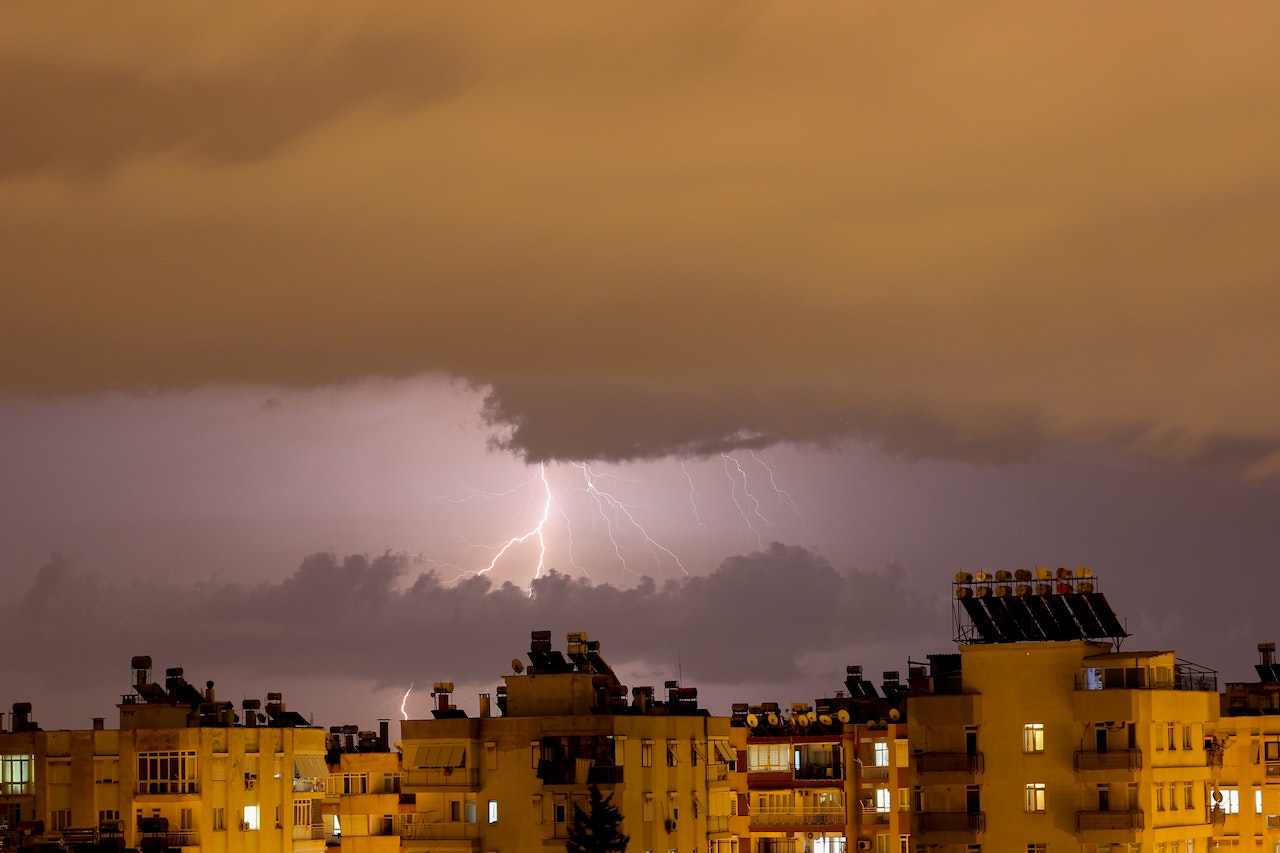 Building Under the Cloudy Sky with Lightning