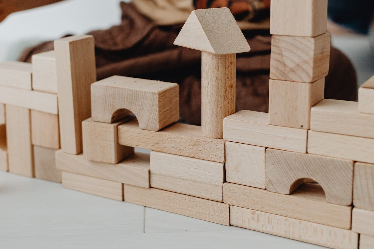 Wooden Building Blocks stacked to make a castle