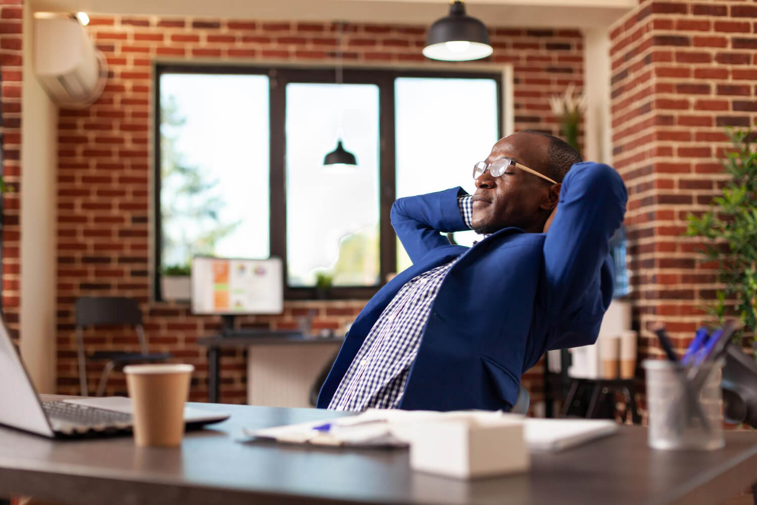 business-man-relaxing-after-finishing-task-taking-break